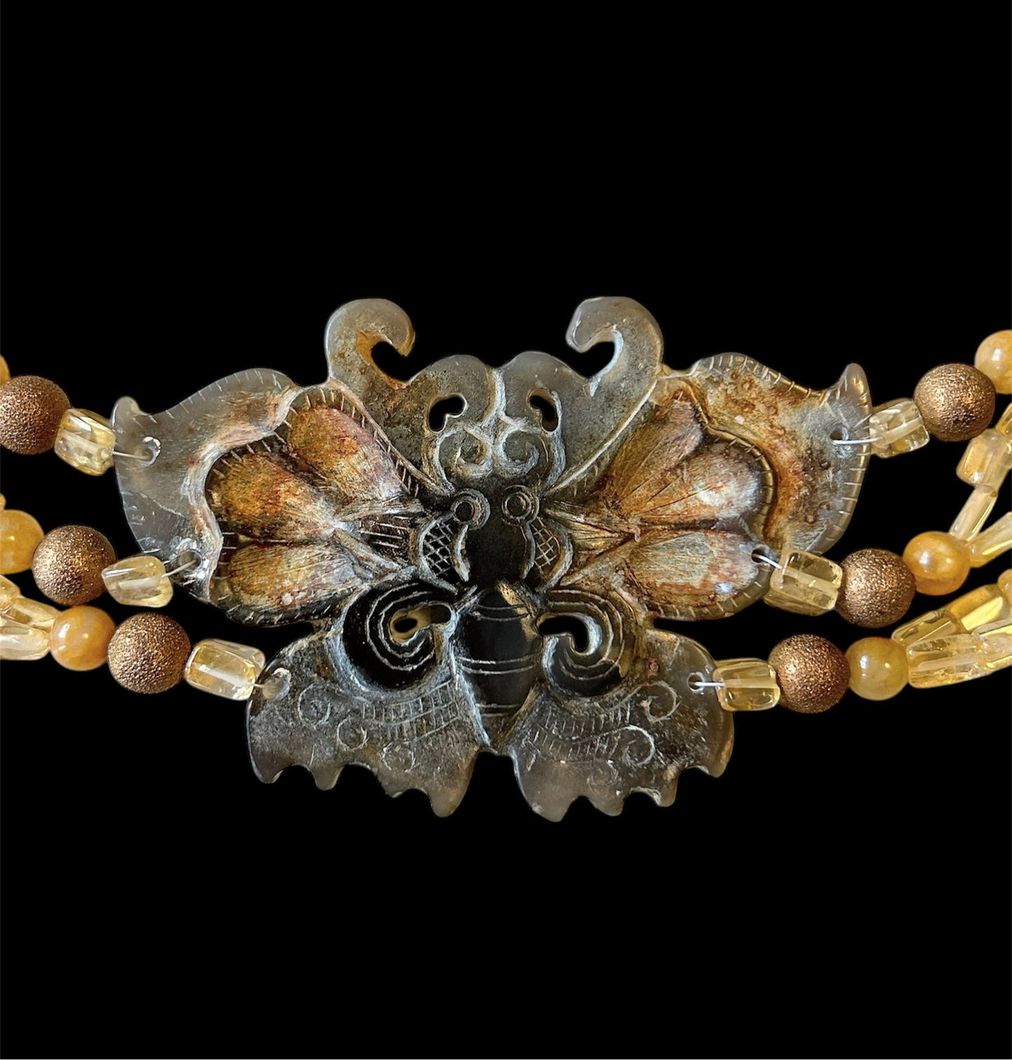 Citrine chocker with moth carving