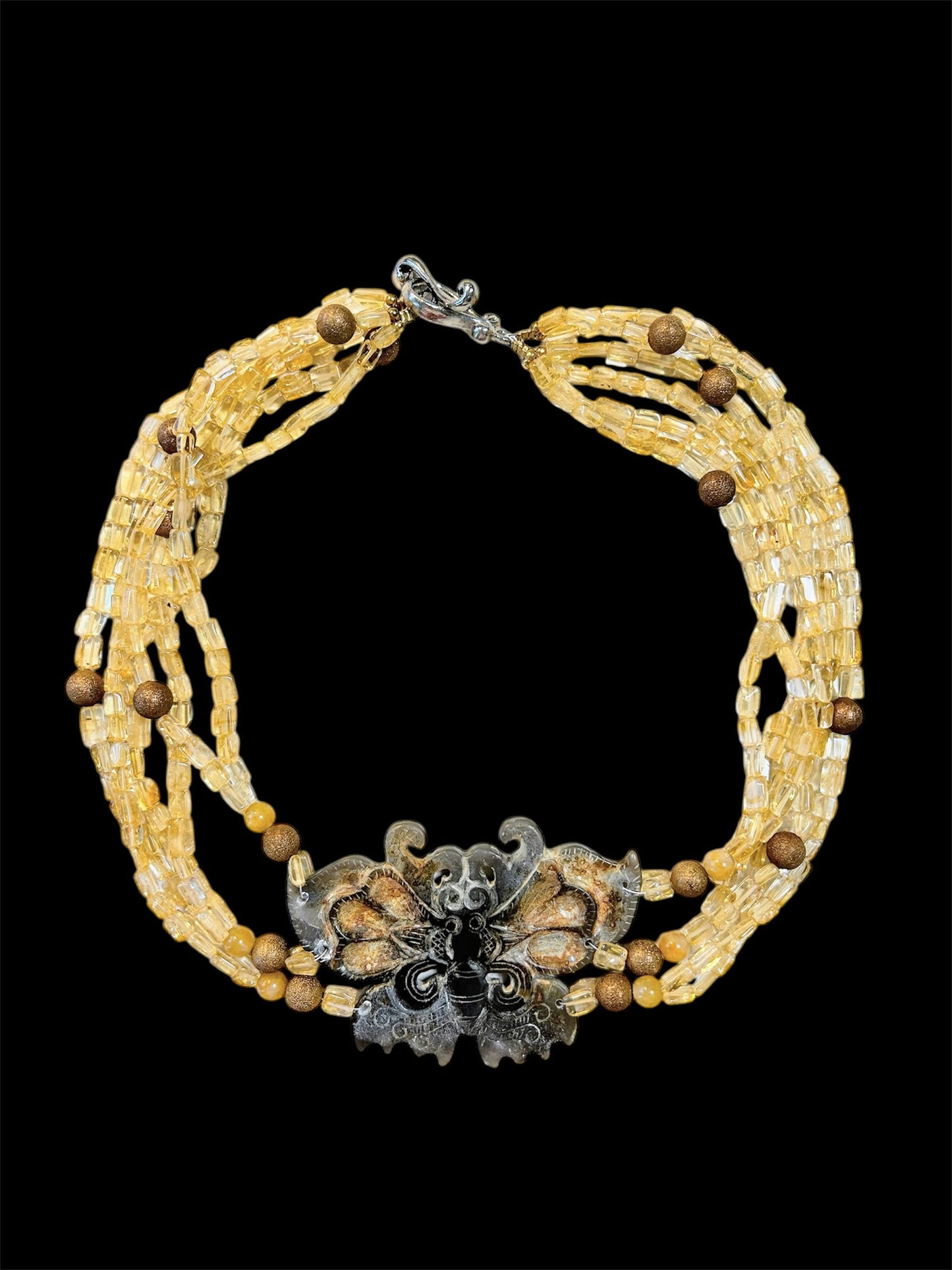Citrine chocker with moth carving