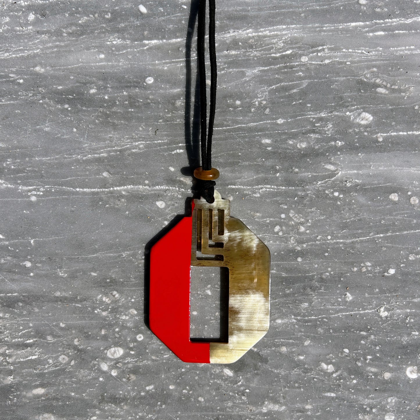 Octogonal buffalo horn and lacquer pendant