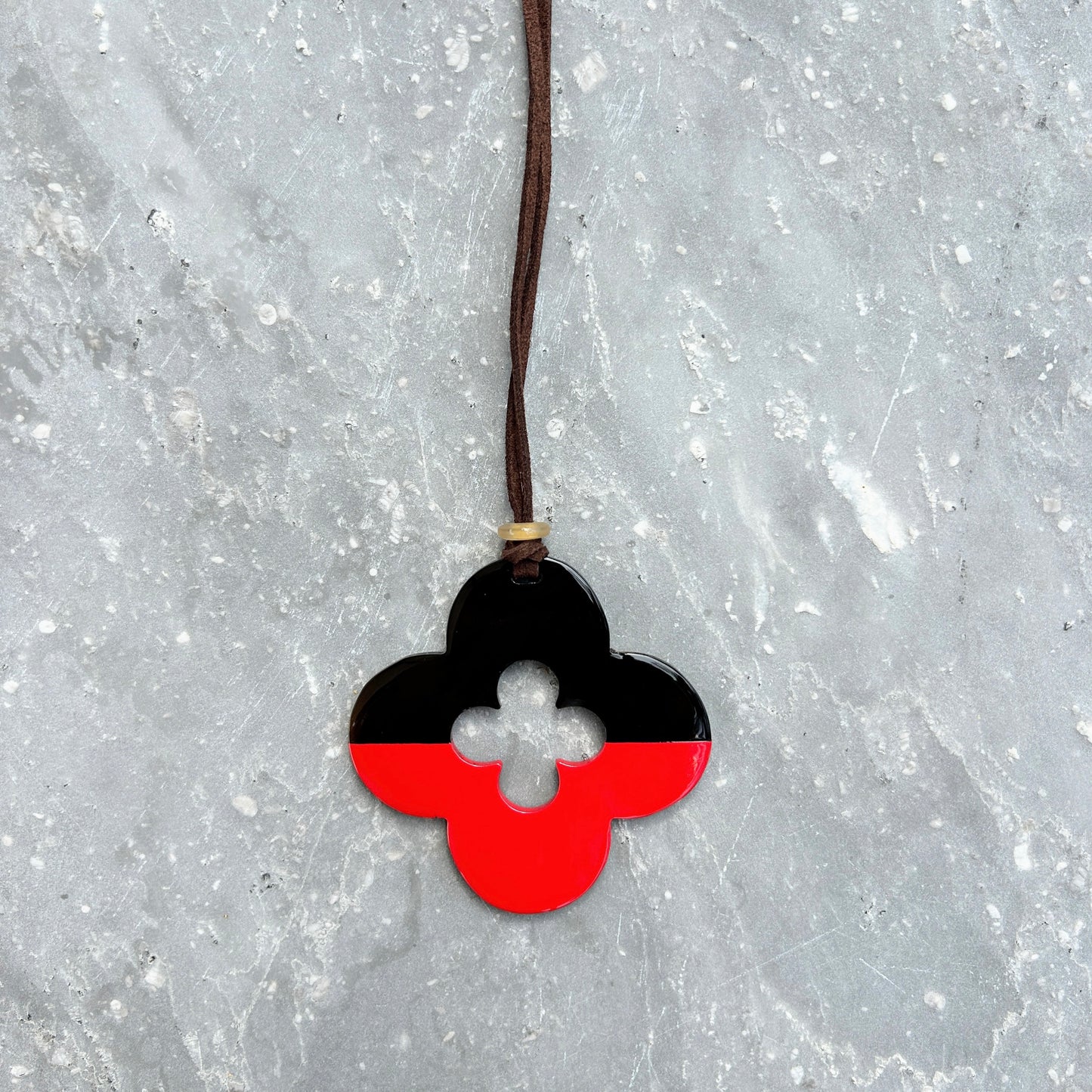 Clover buffalo horn and lacquer pendant