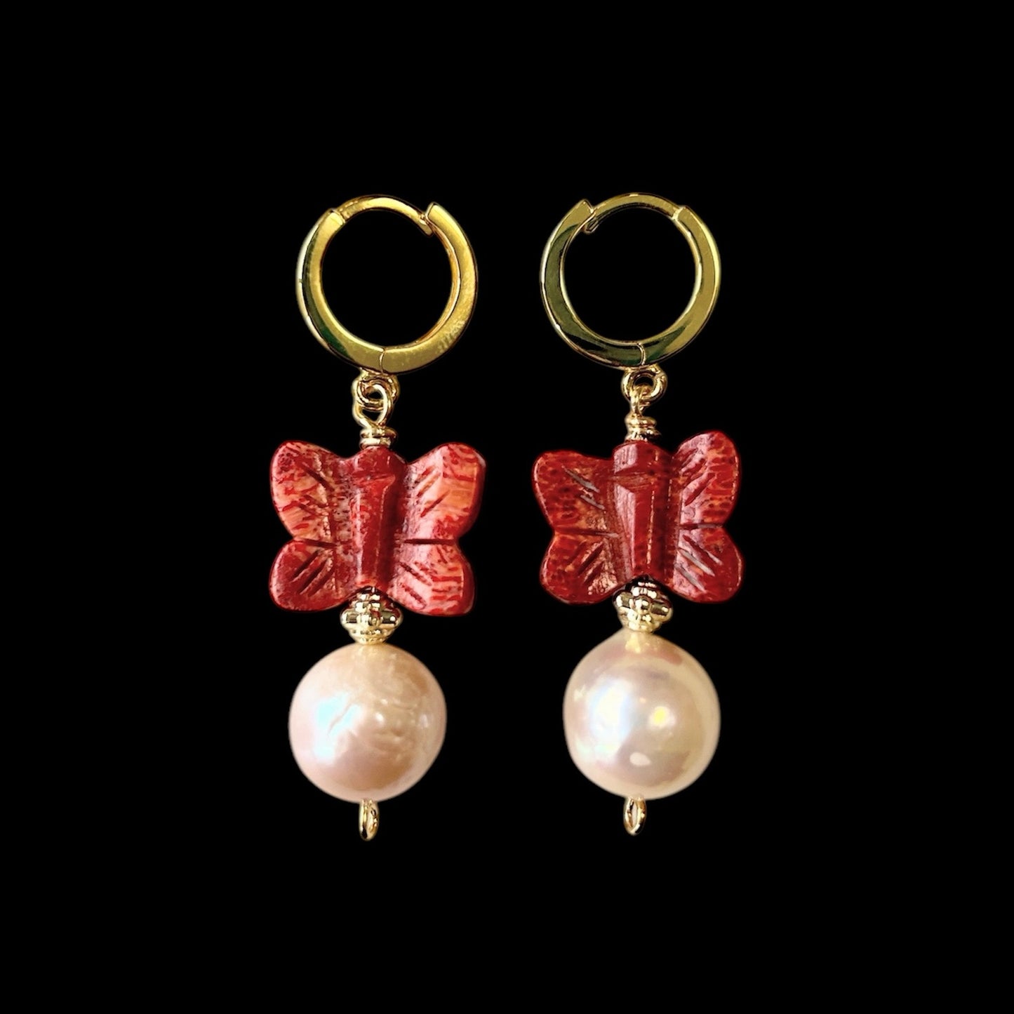 Freshwater pearl earrings with sponge coral butterflies