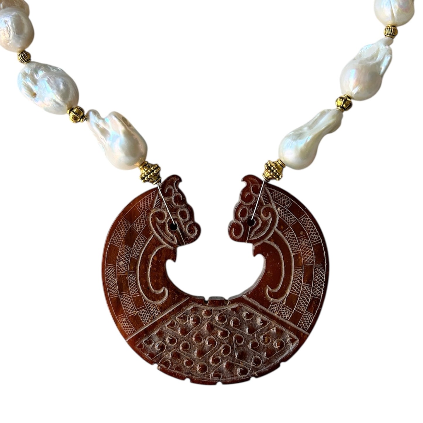 Large baroque freshwater pearl choker with a carving in the shape 2 lions