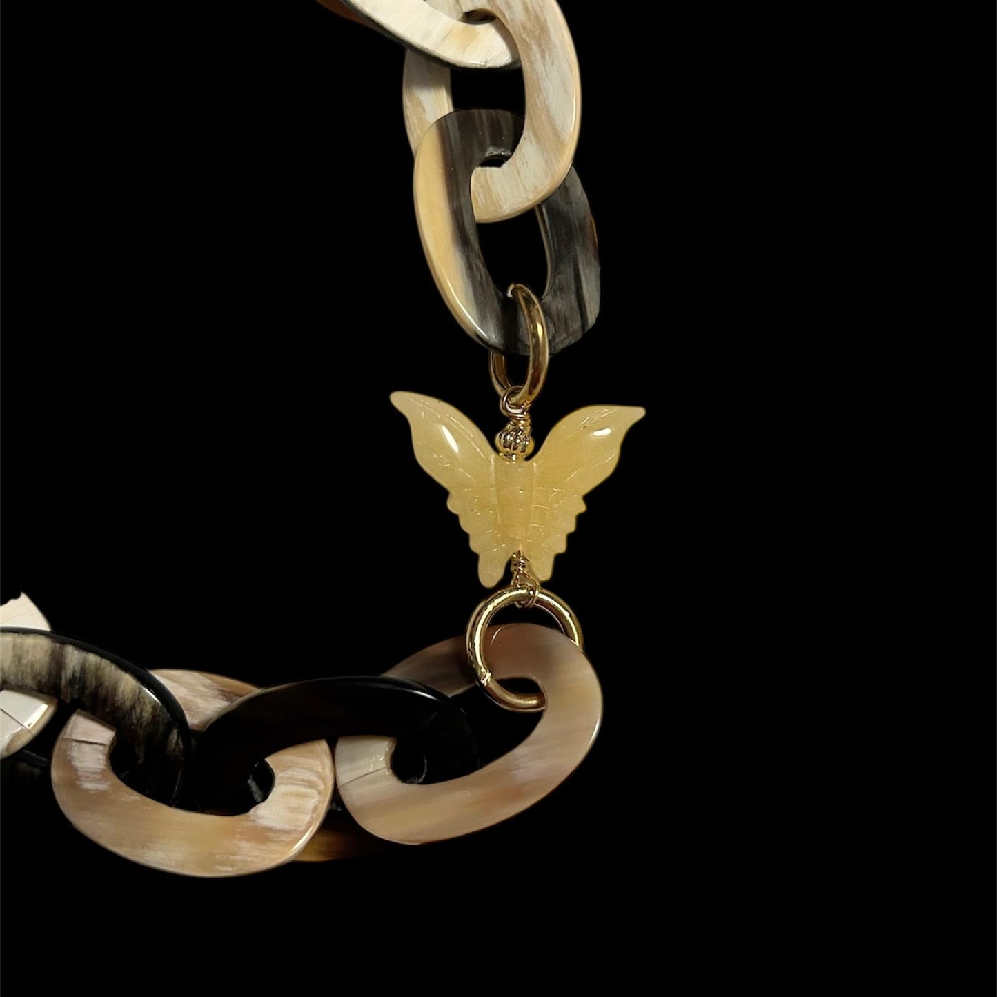 Buffalo horn necklace with yellow jade and red agate butterflies