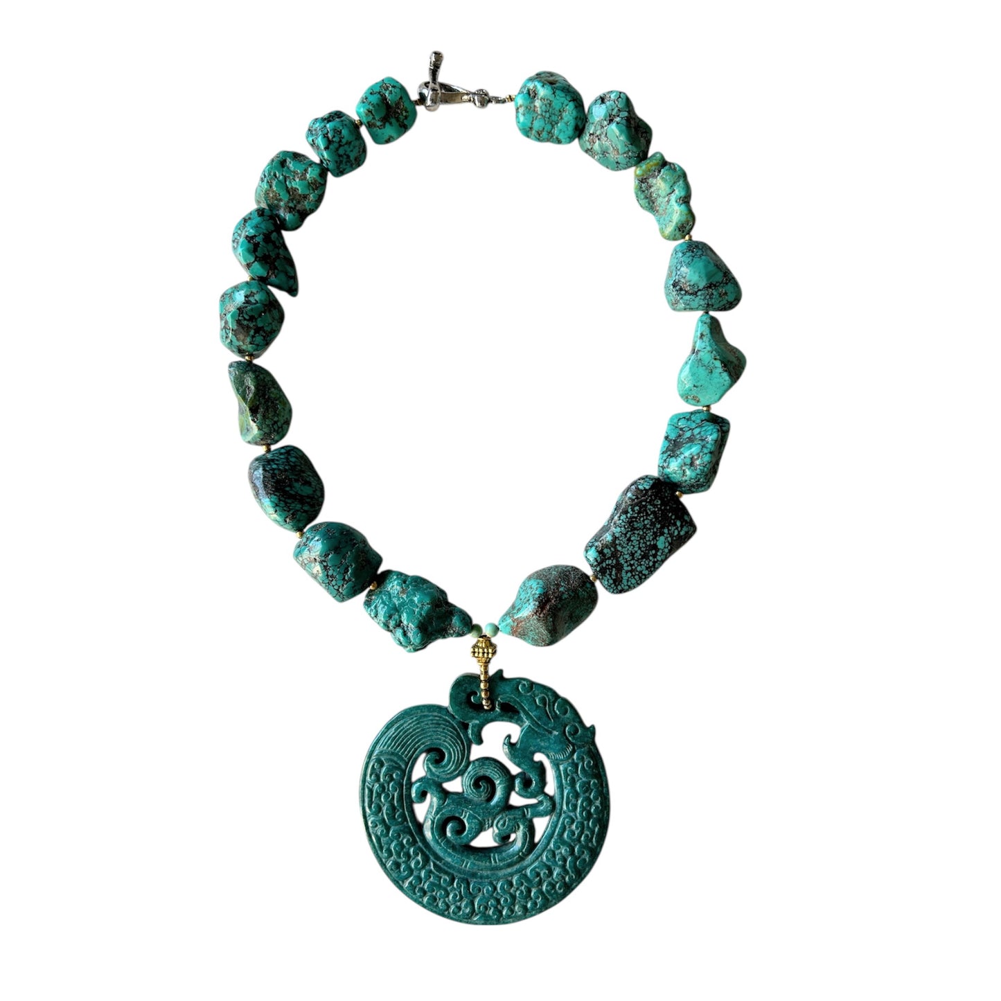Turquoise chocker with a hand carved stone dragon
