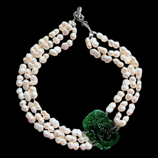 3 strand peanut freshwater pearl choker with jade dragon and phoenix carving