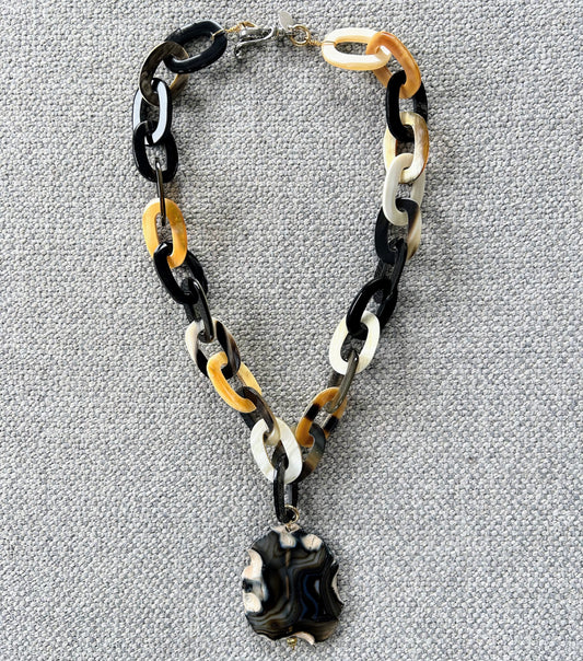 Buffalo horn necklace with striped agate pendant