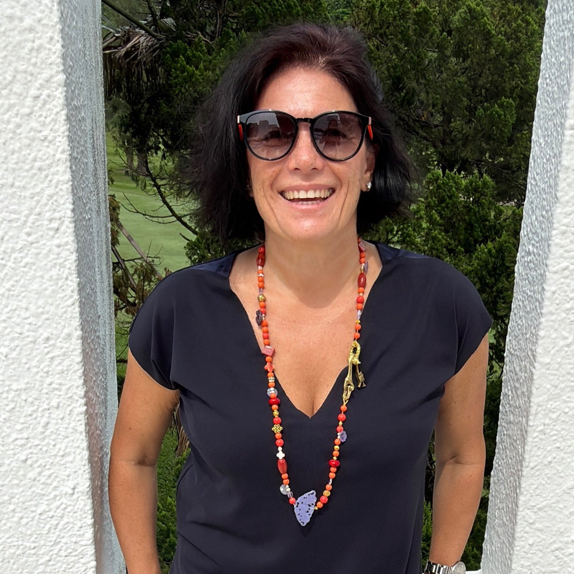Shell coral necklace with jade carvings, a brass dragon clasp, semi-precious stones and freshwater pearls