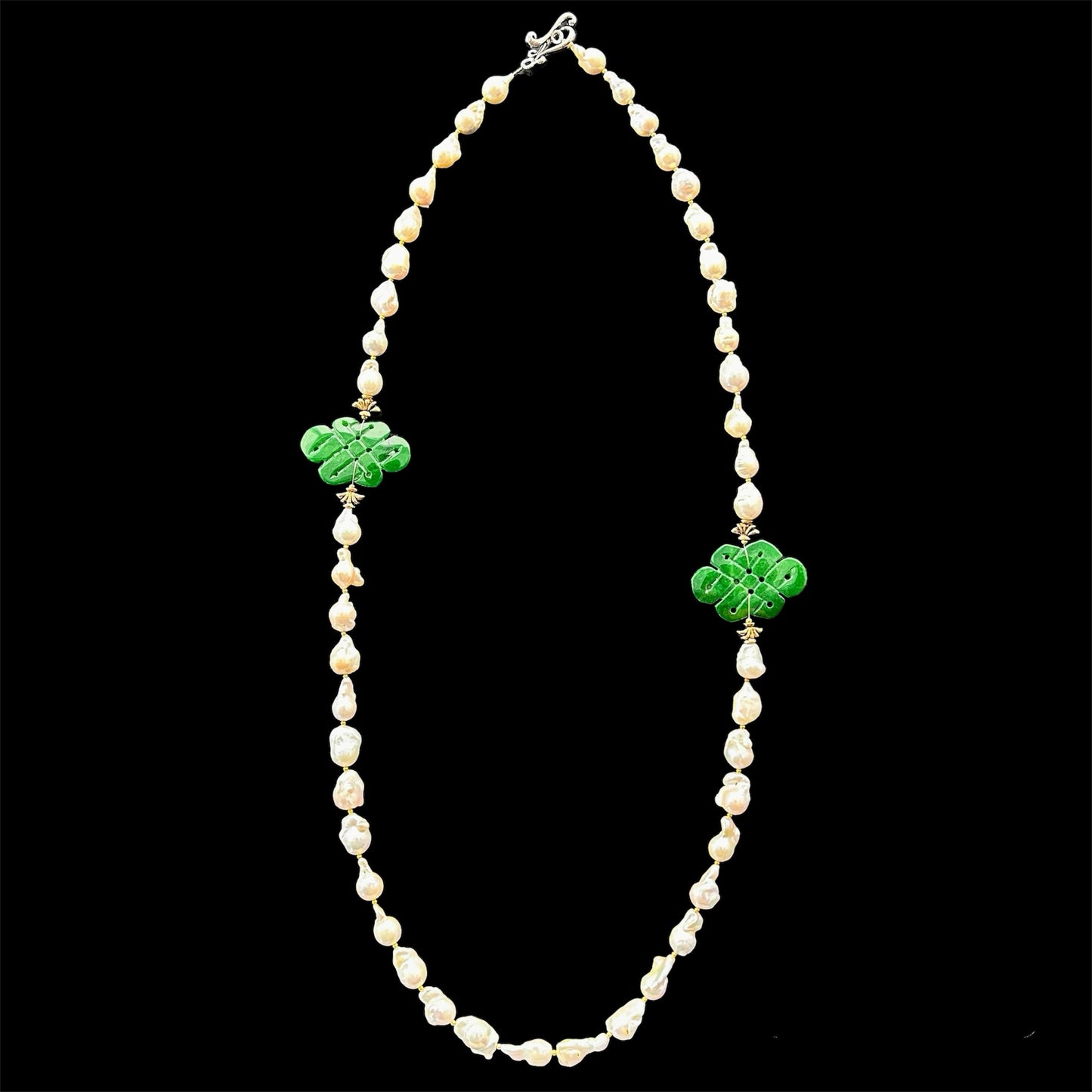 Baroque freshwater pearl necklace with jade infinity knot carvings