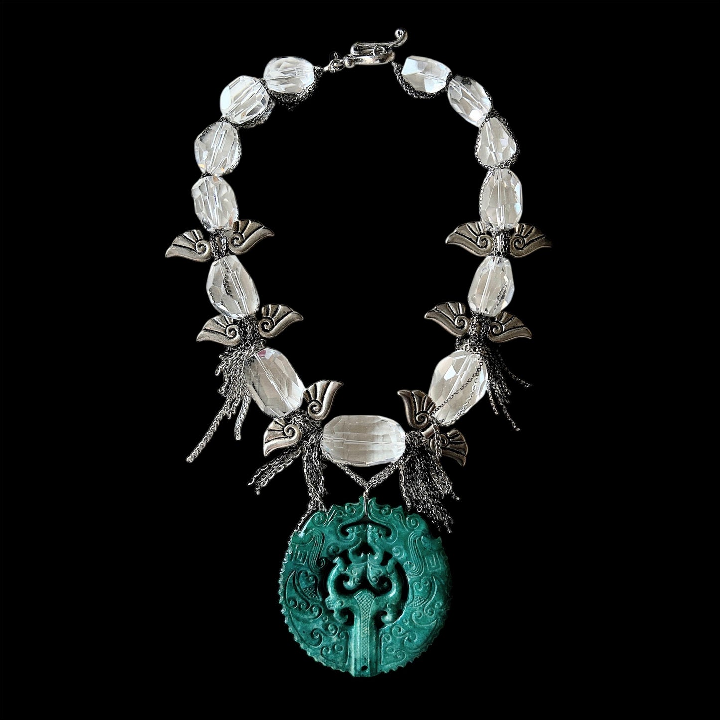 Cut crystal choker with dragon carved pendant and wings