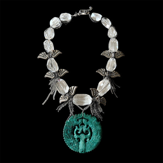 Cut crystal choker with dragon carved pendant and wings
