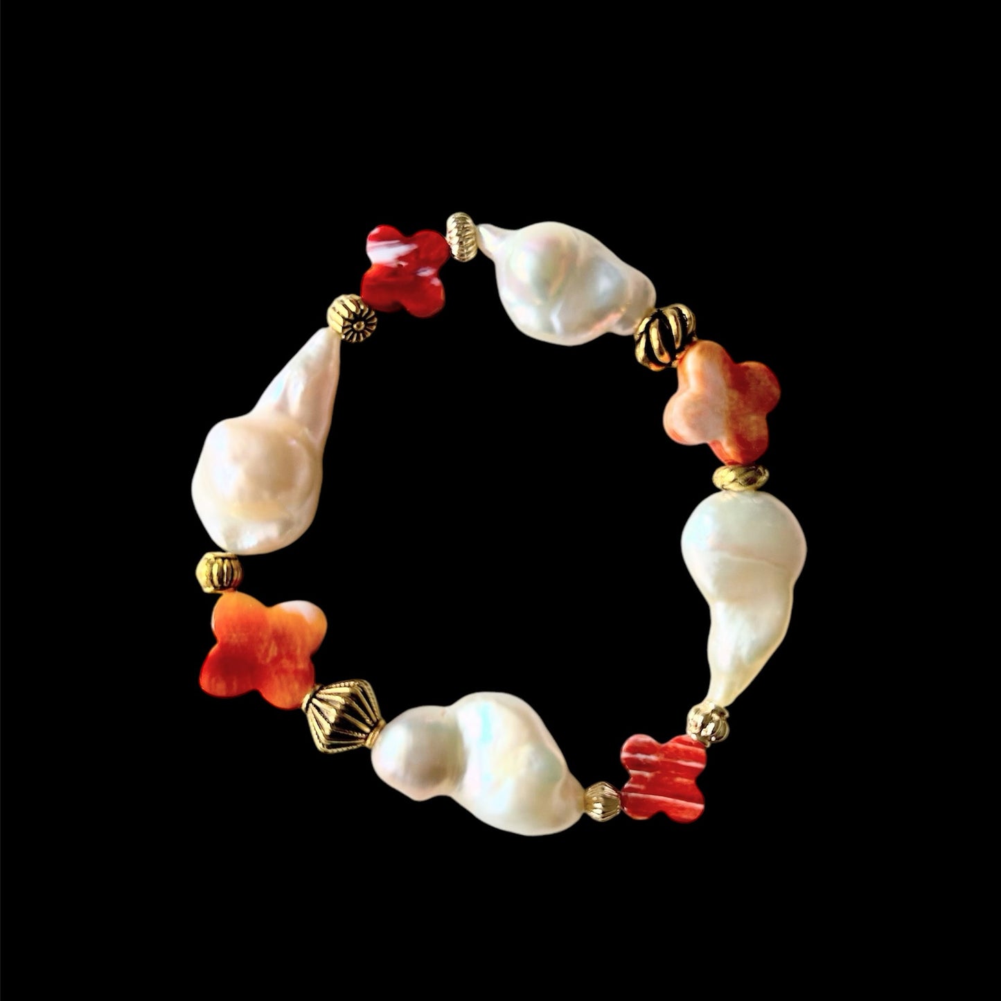 Flat baroque freshwater pearl and conch shell bracelet