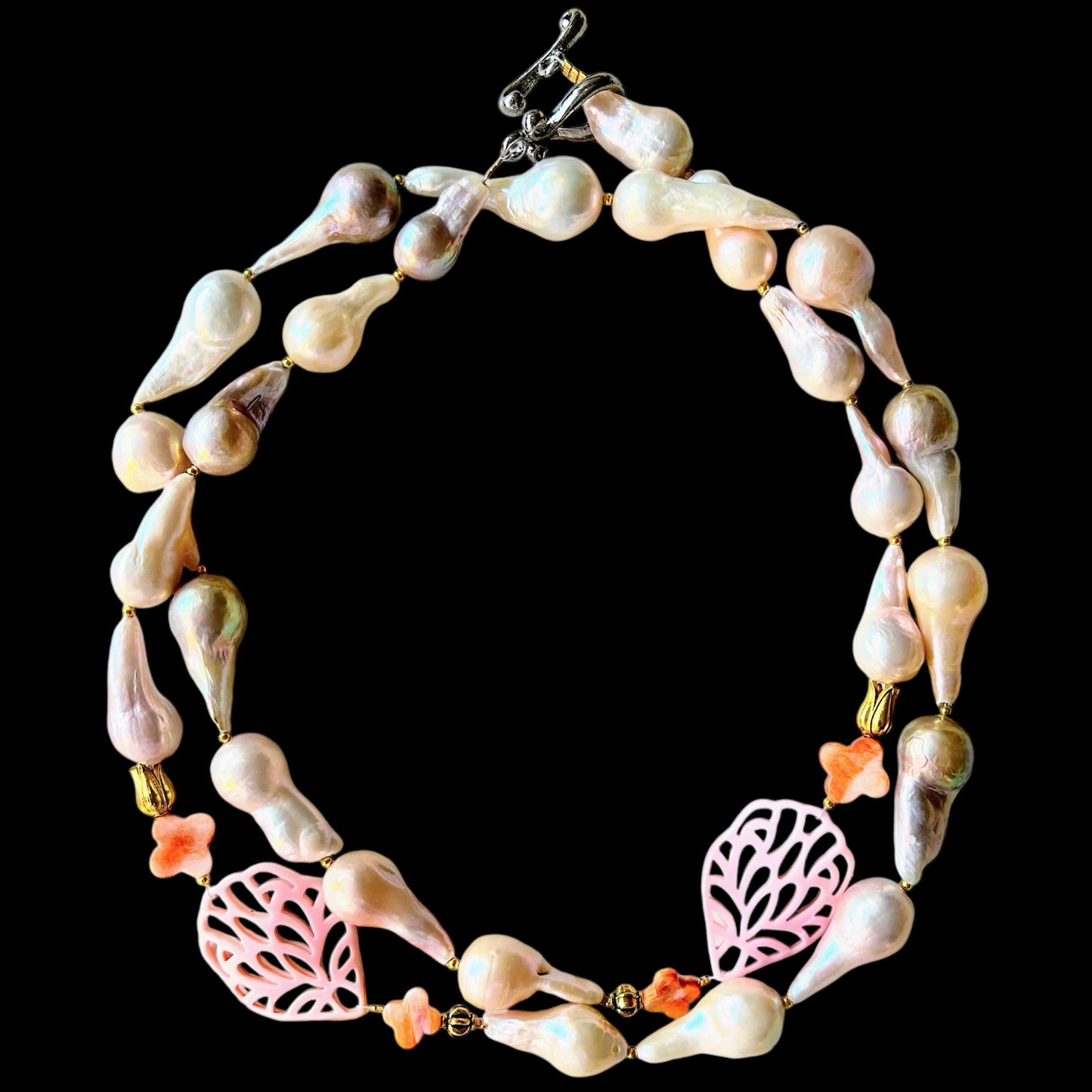 Elongated baroque freshwater pearl and conch shell necklace