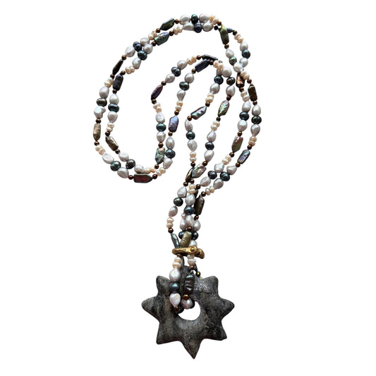 Double strand pearl necklace with stone star