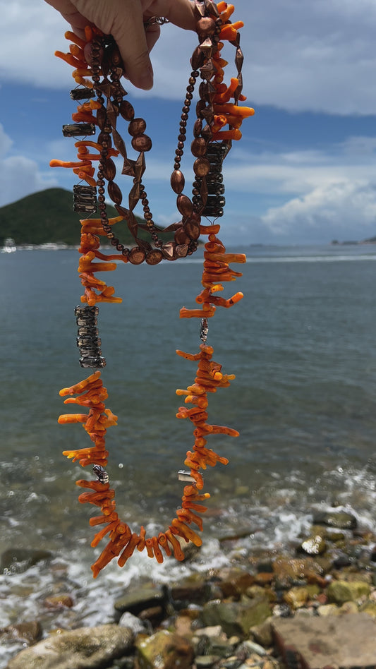 Bamboo coral (orange) necklace with copper beads and rhinestones